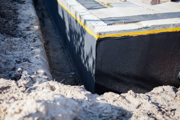 Professional Waterproofing technician working in Ashippun, WI